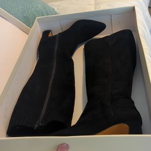 New in original box. Black suede leather size 6.5   2 inch heel